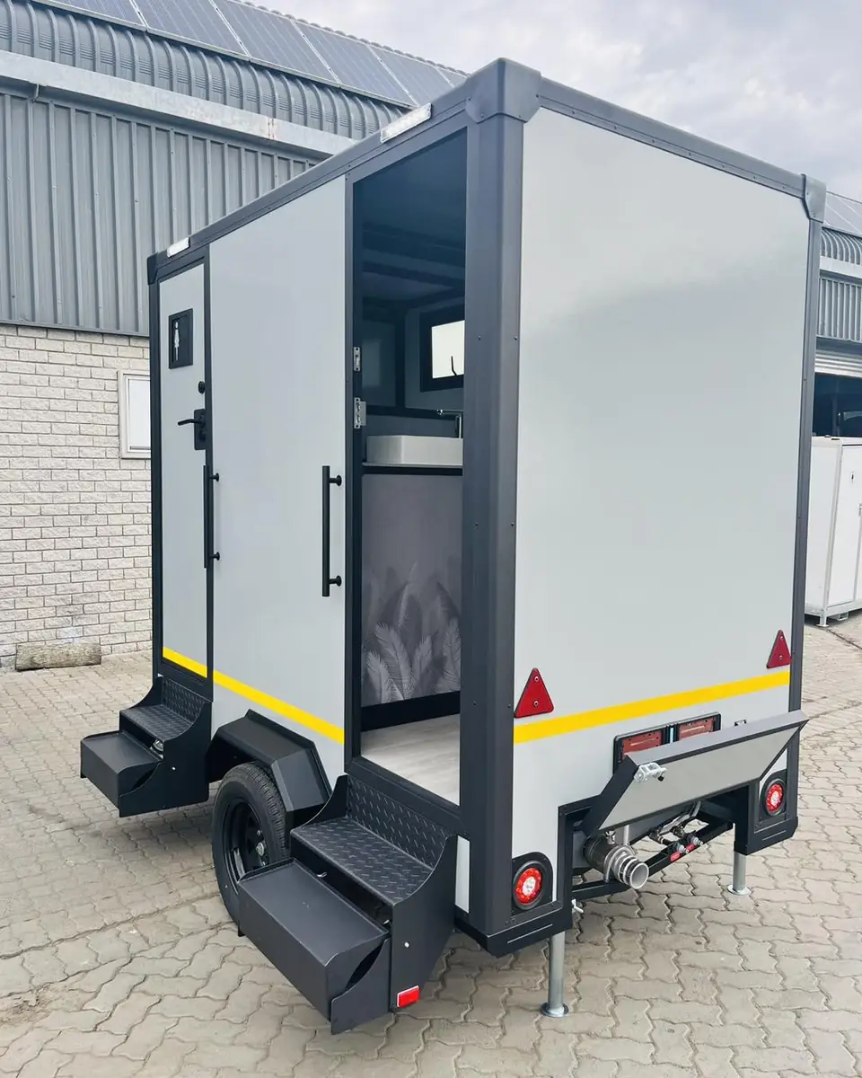 Restroom trailer rear view with fold-down steps